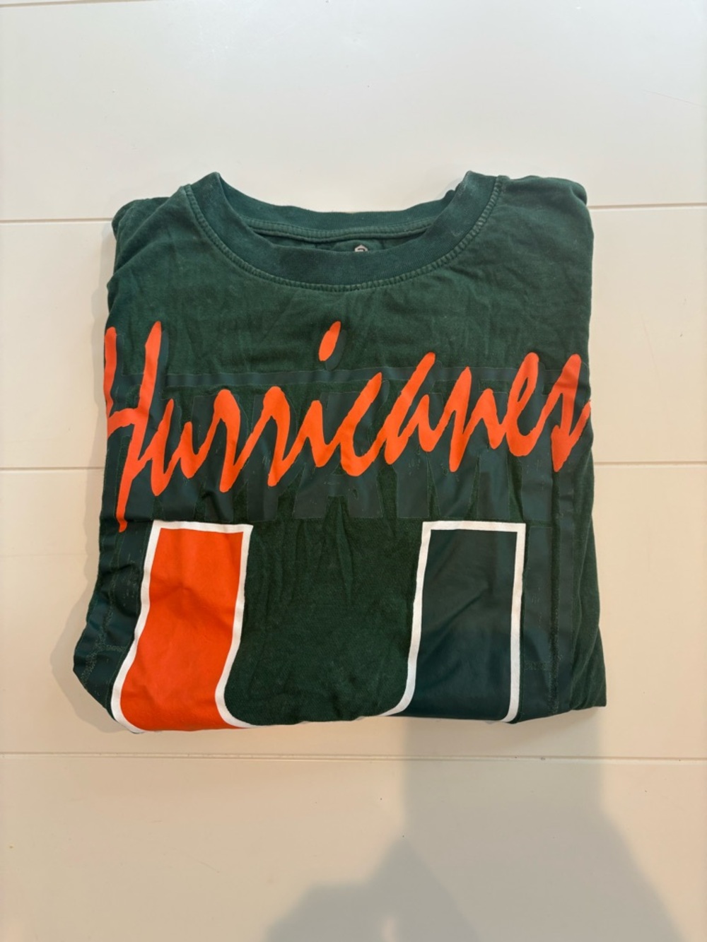 Green "Hurricanes" Short Sleeve Tee with Orange Accents